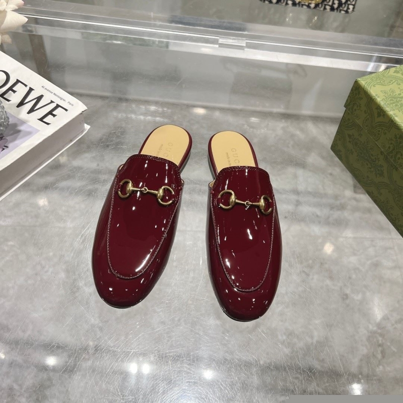 G*u*i slippers
